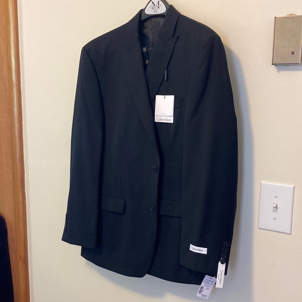 NWT Calvin Klein navy/black suit. Slim fit. Jacket and pant.